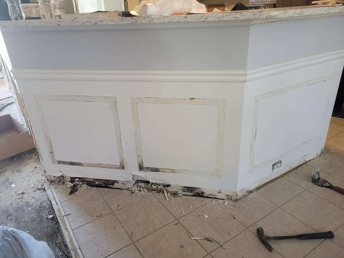 Water damage and mold on kitchen during Storm Damage Restoration in Ogden